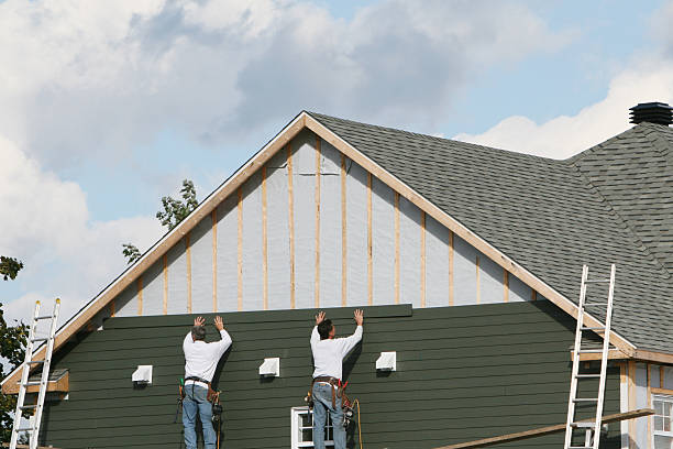 Professional Siding Replacement technician working in Burlington, NC